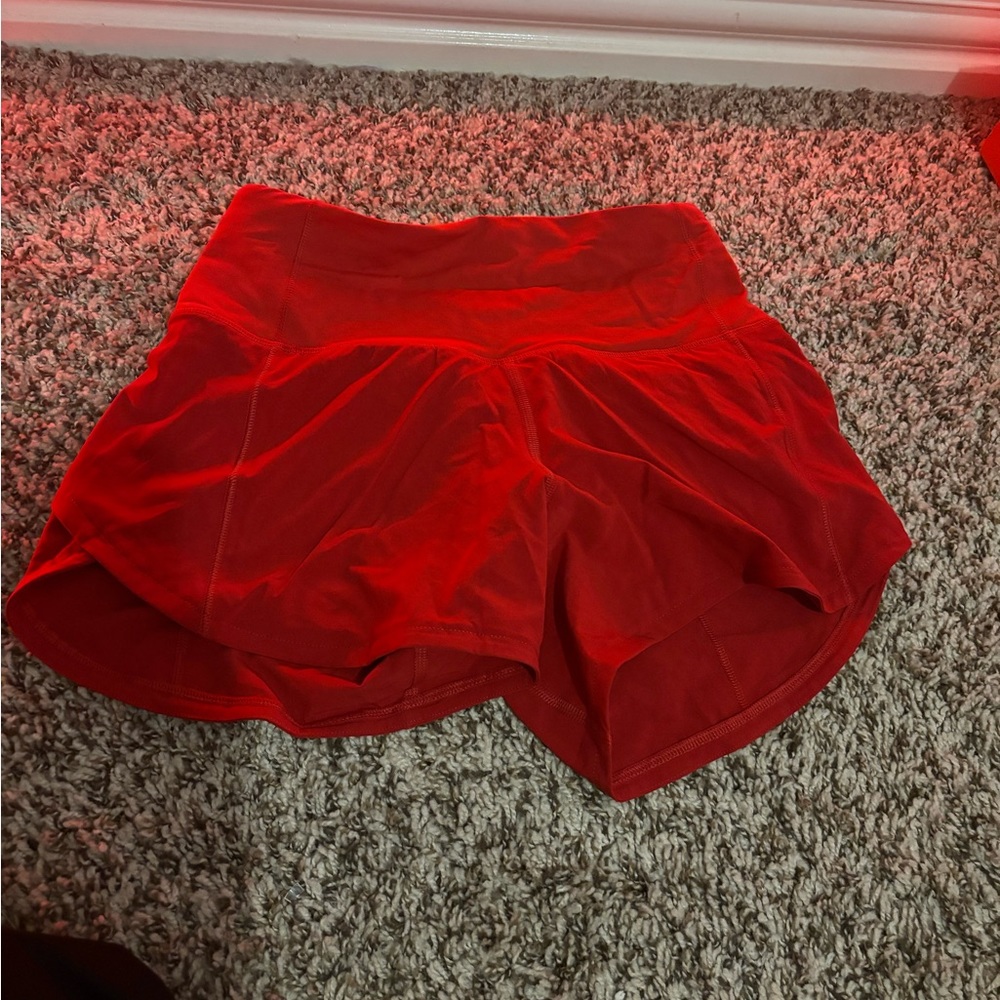 red lululemon shorts
